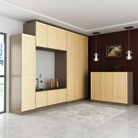 a selection of varying sizes of internal pine louvre doors hung on cupboards in a living room